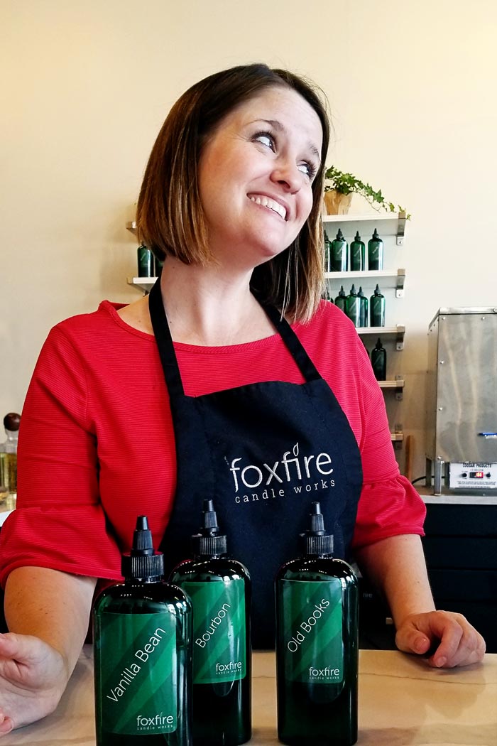 Woman in a red dress wearing a foxfire apron