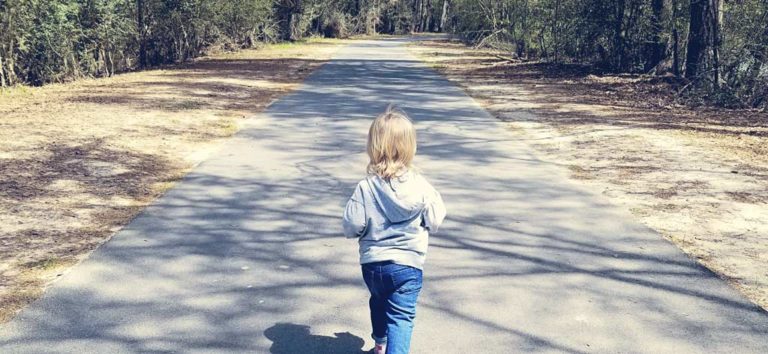 Blonde Toddler walking at Kickerillo-Mischer Preserve