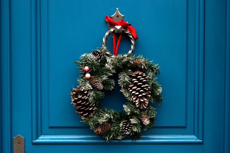 Blue door with a Christmas wreath for sensory friendly fun