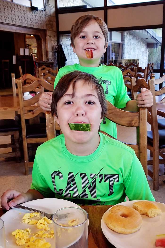 Two boys eating breakfast at the Chisos Mountain Lodge in Big Bend National Park.