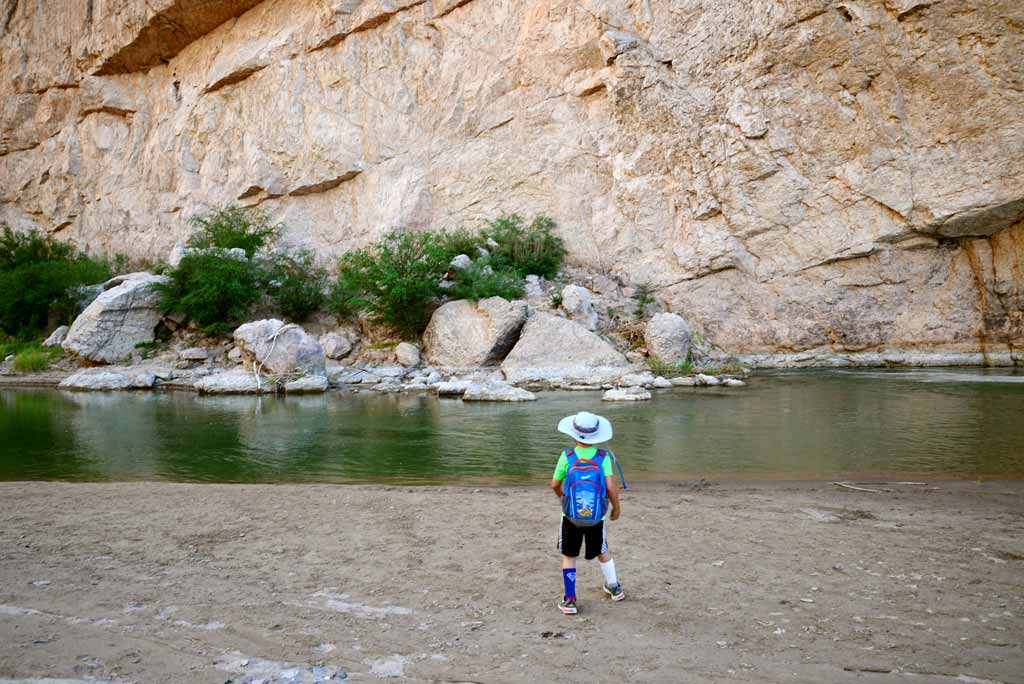 Little boy hiking Boquillas Canyon