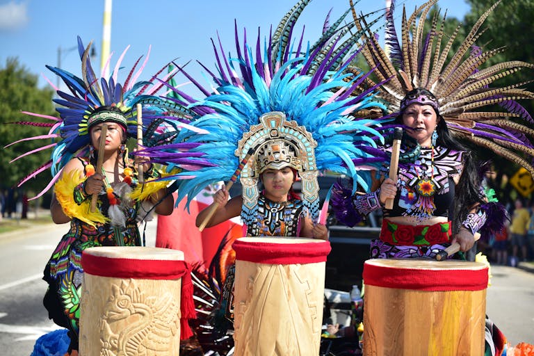 People Wearing White and Black Traditional Dress